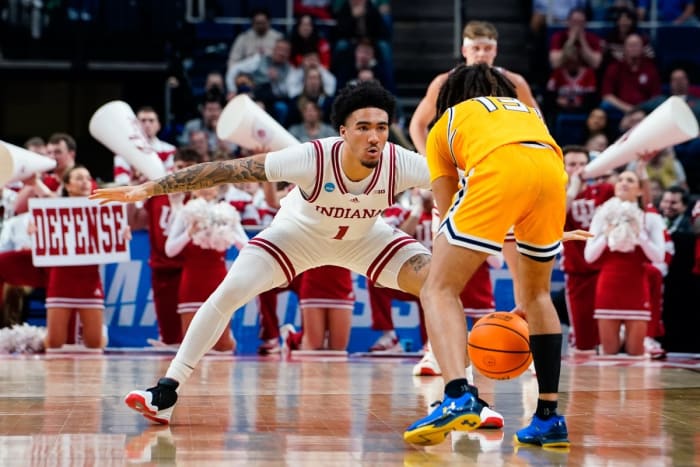 Golden Flashes guard Jalen Sullinger (13) dribbles the ball up court against Indiana Hoosiers guard Jalen Hood-Schifino (1).